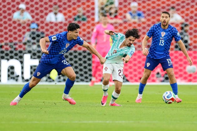 Portugal v Croatia: Round Of 32 - FIFA World Cup, WM, Weltmeisterschaft, Fussball 2026 Igor Matanovic of Croatia and Vitinha of Portugal competes for the ball during the FIFA World Cup 2026 Round Of 32 match between Portugal and Croatia at Toronto Stadium on July 2, 2026 in Toronto, Canada.  SanjinxStrukic PIXSELL