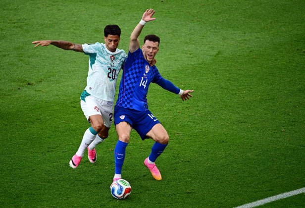 July 2, 2026, Toronto, On, CANADA: Portugal s Joao Cancelo (20) and Croatia s Ivan Perisic (14) vie for the ball during the first half of a World Cup round of 32 soccer match, in Toronto on Thursday, July 2, 2026. Canada News - July 2, 2026  - ZUMAc35_ 20260702_zaf_c35_109 Copyright: xSammyxKoganx
