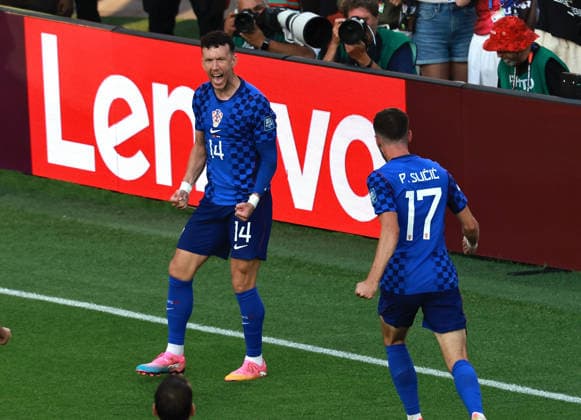 (260703) -- TORONTO, July 3, 2026 -- Ivan Perisic (L) of Croatia celebrates after scoring during the round of 32 match between Portugal and Croatia at the 2026 FIFA World Cup, WM, Weltmeisterschaft, Fussball at Toronto Stadium in Toronto, Canada, July 2, 2026. (Photo by Xinhua) (SP)CANADA-TORONTO-FOOTBALL-FIFA WORLD CUP-ROUND OF 32-POR VS CRO YangxShu 