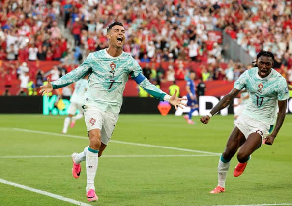 (260703) -- TORONTO, July 3, 2026 -- Cristiano Ronaldo (L) of Portugal celebrates after scoring their first goal during the round of 32 match between Portugal and Croatia at the 2026 FIFA World Cup, WM, Weltmeisterschaft, Fussball at Toronto Stadium in Toronto, Canada, July 2, 2026. (Photo by Xinhua) (SP)CANADA-TORONTO-FOOTBALL-FIFA WORLD CUP-ROUND OF 32-POR VS CRO ZouxZheng 