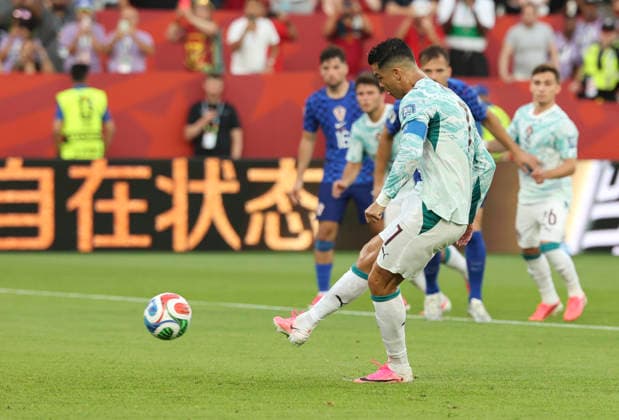 (260703) -- TORONTO, July 3, 2026 -- Cristiano Ronaldo of Portugal shoots and scores his team s first goal from the penalty spot during the round of 32 match between Portugal and Croatia at the 2026 FIFA World Cup, WM, Weltmeisterschaft, Fussball at Toronto Stadium in Toronto, Canada, July 2, 2026. (Photo by Xinhua) (SP)CANADA-TORONTO-FOOTBALL-FIFA WORLD CUP-ROUND OF 32-POR VS CRO ZouxZheng 