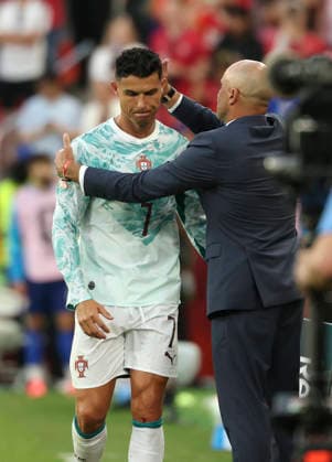 (260703) -- TORONTO, July 3, 2026 -- Cristiano Ronaldo (L) of Portugal interacts with head coach Roberto Martinez after being substituted during the round of 32 match between Portugal and Croatia at the 2026 FIFA World Cup, WM, Weltmeisterschaft, Fussball at Toronto Stadium in Toronto, Canada, July 2, 2026. (Photo by Xinhua) (SP)CANADA-TORONTO-FOOTBALL-FIFA WORLD CUP-ROUND OF 32-POR VS CRO ZouxZheng 