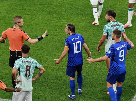 (260703) -- TORONTO, July 3, 2026 -- Luka Modric (3rd L) of Croatia talks to Referee Espen Eskas during the round of 32 match between Portugal and Croatia at the 2026 FIFA World Cup, WM, Weltmeisterschaft, Fussball at Toronto Stadium in Toronto, Canada, July 2, 2026. (Photo by Xinhua) (SP)CANADA-TORONTO-FOOTBALL-FIFA WORLD CUP-ROUND OF 32-POR VS CRO YangxShu 