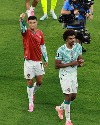 (260703) -- TORONTO, July 3, 2026 -- Cristiano Ronaldo (L) of Portugal greets the audience while wearing a jersey in memory of former player Diogo Jota ahead of the one year anniversary of his death after winning the round of 32 match between Portugal and Croatia at the 2026 FIFA World Cup, WM, Weltmeisterschaft, Fussball at Toronto Stadium in Toronto, Canada, July 2, 2026. (Photo by Xinhua) (SP)CANADA-TORONTO-FOOTBALL-FIFA WORLD CUP-ROUND OF 32-POR VS CRO YangxShu 