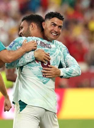 (260703) -- TORONTO, July 3, 2026 -- Cristiano Ronaldo (R) of Portugal hugs Goncalo Ramos after winning the round of 32 match between Portugal and Croatia at the 2026 FIFA World Cup, WM, Weltmeisterschaft, Fussball at Toronto Stadium in Toronto, Canada, July 2, 2026. (Photo by Xinhua) (SP)CANADA-TORONTO-FOOTBALL-FIFA WORLD CUP-ROUND OF 32-POR VS CRO ZouxZheng 