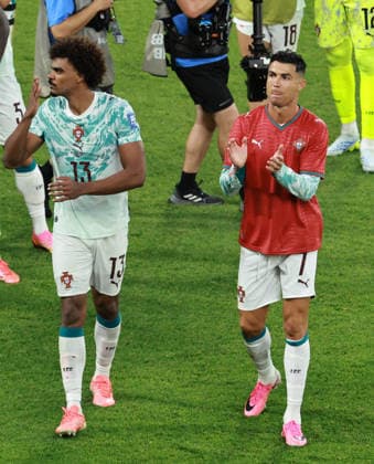 (260703) -- TORONTO, July 3, 2026 -- Cristiano Ronaldo (R) of Portugal greets the audience while wearing a jersey in memory of former player Diogo Jota ahead of the one year anniversary of his death after winning the round of 32 match between Portugal and Croatia at the 2026 FIFA World Cup, WM, Weltmeisterschaft, Fussball at Toronto Stadium in Toronto, Canada, July 2, 2026. (Photo by Xinhua) (SP)CANADA-TORONTO-FOOTBALL-FIFA WORLD CUP-ROUND OF 32-POR VS CRO YangxShu 