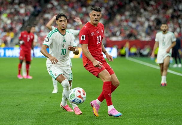 FIFA World Cup, WM, Weltmeisterschaft, Fussball 2026 - Round of 32 - Switzerland vs Algeria Fares Chaibi (L) of Algeria and Granit Xhaka of Switzerland in action during the FIFA World Cup 2026 Round of 32 match Switzerland against Algeria, in Vancouver, Canada, 02 July 2026. VANCOUVER Canada  Copyright: xBOBxFRIDx