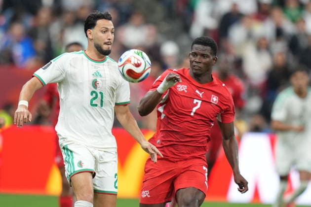 Switzerland v Algeria - FIFA World Cup, WM, Weltmeisterschaft, Fussball 2026 - Round of 32 VANCOUVER, CANADA - JULY 02: Breel Embolo (7) of Switzerland in action against Ramy Bensebaini (21) of Algeria during the 2026 FIFA World Cup Round of 32 match between Switzerland and Algeria at BC Place (Vancouver Stadium) in Vancouver, British Columbia, Canada on July 02, 2026. Ercin Erturk Anadolu British Columbia Canada. Editorial use only. Please get in touch for any other usage.  Copyright: x2026xAnadoluxErcinxErturkx