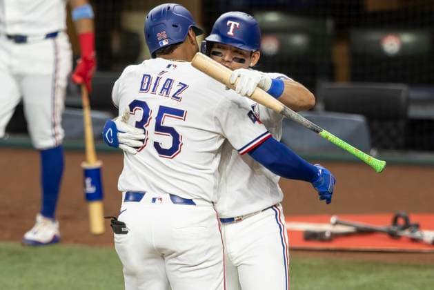 July 2, 2026, Arlington, Texas, USA: Texas Rangers left fielder ALEJANDRO OSUNA (19) congratulates Texas Rangers designated hitter ELIAS DIAZ (35) after hitting a homerun during a MLB, Baseball Herren, USA game between the Detroit Tigers and Texas Rangers at Globe Life Field. Rangers win 10-4. Arlington USA - ZUMAf180 20260702_zsp_f180_005 Copyright: xMarkxFannx