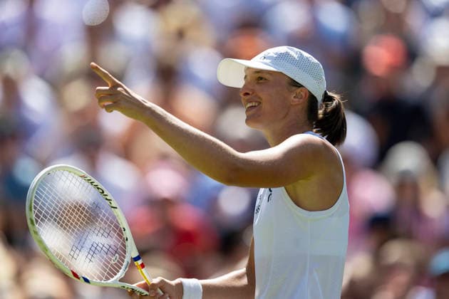 (260703) -- LONDON, July 3, 2026 -- Iga Swiatek of Poland reacts during the women s singles second round match against Karolina Pliskova of the Czech Republic at the Wimbledon Tennis Championships in London, Britain, on July 2, 2026. (Photo by Xinhua) (SP)BRITAIN-LONDON-TENNIS-WIMBLEDON-WOMEN S SINGLES StephenxChung 