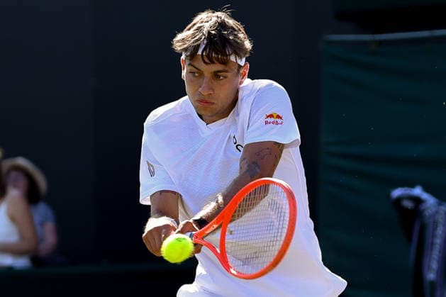 (260703) -- LONDON, July 3, 2026 -- Flavio Cobolli of Italy returns the ball during the men s singles second round match against James Duckworth of Australia at the Wimbledon Tennis Championships in London, Britain, on July 2, 2026. (Photo by Xinhua) (SP)BRITAIN-LONDON-TENNIS-WIMBLEDON-MEN S SINGLES DinendraxHaria 