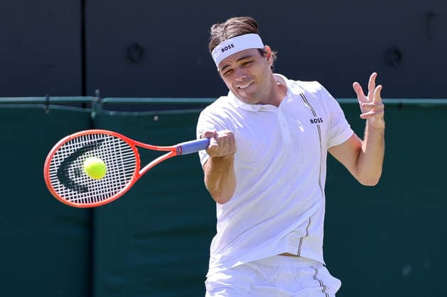 (260703) -- LONDON, July 3, 2026 -- Taylor Fritz of the United States returns the ball during the men s singles second round match against Patrick Kypson of the United States at the Wimbledon Tennis Championships in London, Britain, on July 2, 2026. (Photo by Xinhua) (SP)BRITAIN-LONDON-TENNIS-WIMBLEDON-MEN S SINGLES DinendraxHaria 