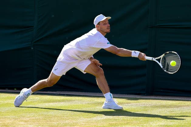 (260703) -- LONDON, July 3, 2026 -- James Duckworth of Australia returns the ball during the men s singles second round match against Flavio Cobolli of Italy at the Wimbledon Tennis Championships in London, Britain, on July 2, 2026. (Photo by Xinhua) (SP)BRITAIN-LONDON-TENNIS-WIMBLEDON-MEN S SINGLES DinendraxHaria 