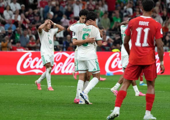 (260703) -- VANCOUVER, July 3, 2026 -- Houssem Aouar (3rd L) of Algeria hug his teammate after missing a chance to score during the round of 32 match between Switzerland and Algeria at the 2026 FIFA World Cup, WM, Weltmeisterschaft, Fussball at BC Place Vancouver in Vancouver, Canada, July 2, 2026. ) (SP)CANADA-VANCOUVER-FOOTBALL-FIFA WORLD CUP-ROUND OF 32-SUI VS ALG MengxYongmin 