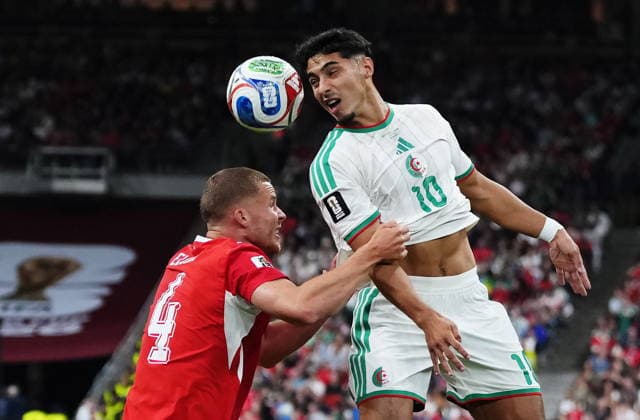July 2, 2026, Vancouver, Bc, CANADA: Algeria s Fares Chaibi (10) heads the ball over Switzerland s Nico Elvedi (4) during the first half of a World Cup Round of 32 soccer match, in Vancouver, on Thursday, July 2, 2026. Canada News - July 2, 2026  - ZUMAc35_ 20260702_zaf_c35_321 Copyright: xEthanxCairnsx