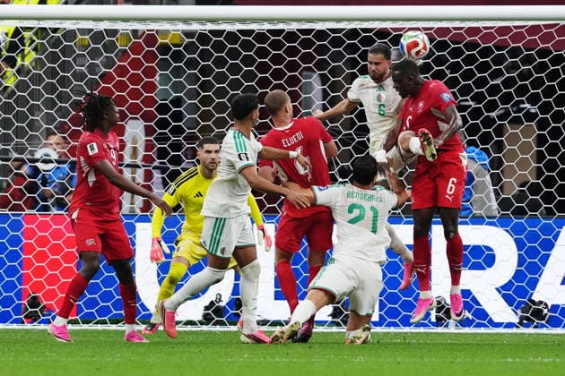 July 2, 2026, Vancouver, Bc, CANADA: Switzerland s Denis Zakaria (right) and Algeria s Ramiz Zerrouki (second right) vie for the ball in front of Algeria goalkeeper Luca Zidane (second left) during the first half of a World Cup Round of 32 soccer match, in Vancouver, on Thursday, July 2, 2026. Canada News - July 2, 2026  - ZUMAc35_ 20260702_zaf_c35_332 Copyright: xEthanxCairnsx