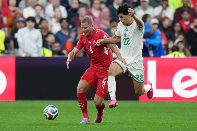July 2, 2026, Vancouver, Bc, CANADA: Switzerland s Nico Elvedi (4) and Algeria s Ibrahim Maza (22) vie for the ball during the first half of a World Cup Round of 32 soccer match, in Vancouver, on Thursday, July 2, 2026. Canada News - July 2, 2026  - ZUMAc35_ 20260702_zaf_c35_335 Copyright: xDarrylxDyckx