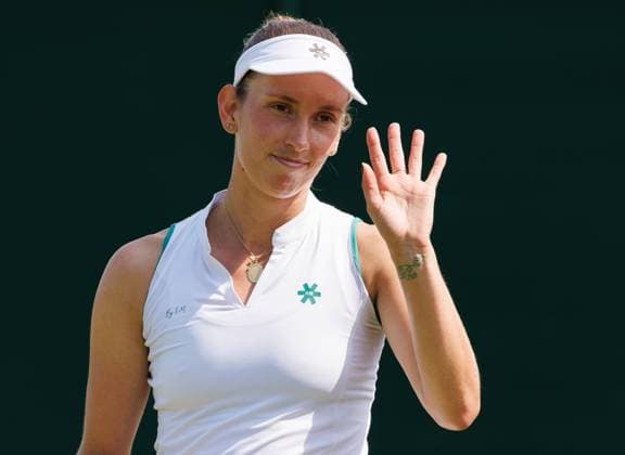 Belgian Elise Mertens celebrates after winning a doubles tennis match between Romanian pair Cristian-Begu and Belgian-Chinese pair Mertens-Zhang, in the first round of the Women s doubles at the Wimbledon grand slam tennis tournament in London, Britain, Friday 03 July 2026. BENOITxDOPPAGNE  x180264701x
