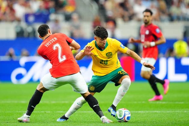Australia v Egypt - FIFA World Cup, WM, Weltmeisterschaft, Fussball 2026 - Round of 32 ARLINGTON, USA - JULY 03: Cristian Volpato (20) of Australia in action againstYasser Ibrahim (2) of Egypt during the 2026 FIFA World Cup Round of 32 match between Australia and Egypt at Dallas Stadium in Arlington, Texas, United States on July 03, 2026. Evrim Aydin Anadolu Texas United States. Editorial use only. Please get in touch for any other usage.  Copyright: x2026xAnadoluxEvrimxAydinx