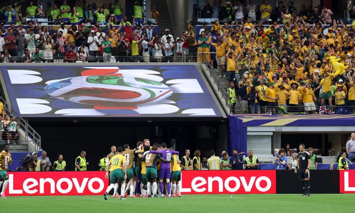 (260704) -- DALLAS, July 4, 2026 -- Players of Australia celebrate Egypt s own goal during the round of 32 match between Australia and Egypt at the 2026 FIFA World Cup, WM, Weltmeisterschaft, Fussball at Dallas Stadium in Dallas, the United States, July 3, 2026. ) (SP)U.S.-DALLAS-FOOTBALL-FIFA WORLD CUP-ROUND OF 32-AUS VS EGY LixYing 