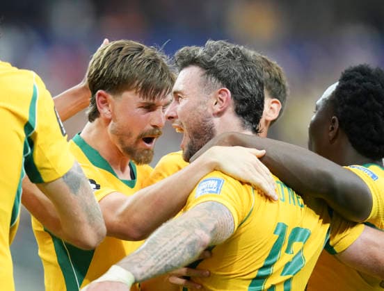 (260704) -- DALLAS, July 4, 2026 -- Players of Australia celebrate Egypt s own goal during the round of 32 match between Australia and Egypt at the 2026 FIFA World Cup, WM, Weltmeisterschaft, Fussball at Dallas Stadium in Dallas, the United States, July 3, 2026. ) (SP)U.S.-DALLAS-FOOTBALL-FIFA WORLD CUP-ROUND OF 32-AUS VS EGY WuxXiaoling 