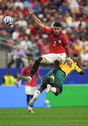 (260704) -- DALLAS, July 4, 2026 -- Yasser Ibrahim (top) of Egypt competes during the round of 32 match between Australia and Egypt at the 2026 FIFA World Cup, WM, Weltmeisterschaft, Fussball at Dallas Stadium in Dallas, the United States, July 3, 2026. ) (SP)U.S.-DALLAS-FOOTBALL-FIFA WORLD CUP-ROUND OF 32-AUS VS EGY WuxXiaoling 
