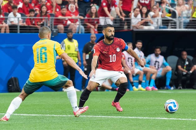 Mohamed Salah of Egypt (R) runs with the ball under pressure from Aziz Behich of Australia (L) during a FIFA Men’s World Cup 2026 round of 32 football match between Australia and Egypt at Dallas Stadium, in Arlington on July 03 2026 (Photo by LVDIDI SPP)  Copyright: xLVDIDI SPPx Sportspressphoto_SPR184069