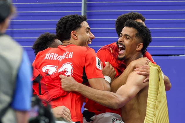 ARLINGTON, TX - JULY 03: Hossam Abdelmaguid 4 of Egypt is mobbed by teammates after winning the FIFA World Cup, WM, Weltmeisterschaft, Fussball 2026 Round of 32 match between Australia and Egypt on July 3, 2026, at Dallas Stadium in Dallas, Texas. (Photo by David Buono Icon Sportswire) SOCCER: JUL 03 FIFA World Cup 26 Round of 32 - Australia vs Egypt EDITORIAL USE ONLY Icon260703042