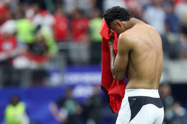 ARLINGTON, TX - JULY 03: Hossam Abdelmaguid 4 of Egypt stands with his jersey over his face after winning in penalty kicks during the FIFA World Cup, WM, Weltmeisterschaft, Fussball 2026 Round of 32 match between Australia and Egypt on July 3, 2026, at Dallas Stadium in Dallas, Texas. (Photo by David Buono Icon Sportswire) SOCCER: JUL 03 FIFA World Cup 26 Round of 32 - Australia vs Egypt EDITORIAL USE ONLY Icon260703046