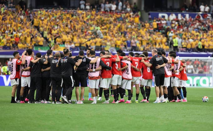 (260704) -- DALLAS, July 4, 2026 -- Members of Egypt celebrate after the round of 32 match between Australia and Egypt at the 2026 FIFA World Cup, WM, Weltmeisterschaft, Fussball at Dallas Stadium in Dallas, the United States, July 3, 2026. ) (SP)U.S.-DALLAS-FOOTBALL-FIFA WORLD CUP-ROUND OF 32-AUS VS EGY LixYing 