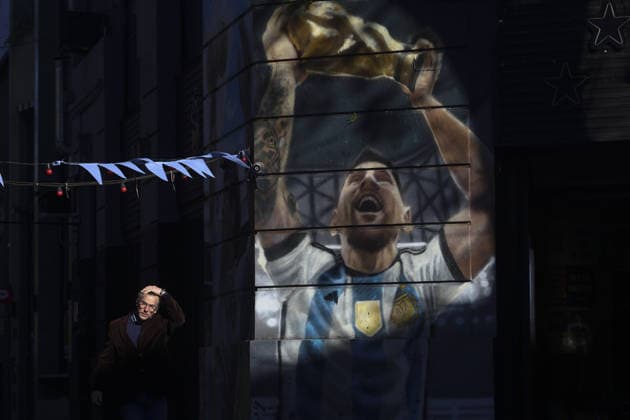 Murals across Buenos Aires depict football legends Diego Maradona and Messi BUENOS AIRES, ARGENTINA – JULY 3: A man walks past a mural depicting football legend Lionel Messi lifting the FIFA World Cup, WM, Weltmeisterschaft, Fussball trophy, in Buenos Aires, Argentina, on July 3, 2026. Buenos Aires is home to dozens of murals depicting football legends Lionel Messi and Diego Maradona, turning the city s streets into an open-air gallery. Neighborhoods including La Paternal, San Telmo, Palermo, La Boca, and Villa del Parque feature vibrant street art paying tribute to Argentina s two greatest football icons. The city s football culture also extends beyond the murals, with fans dressed as Messi and Maradona and shops displaying merchandise dedicated to both players. Matias Baglietto Anadolu Buenos Aires Argentina. Editorial use only. Please get in touch for any other usage.  Copyright: x2026xAnadoluxMatiasxBagliettox