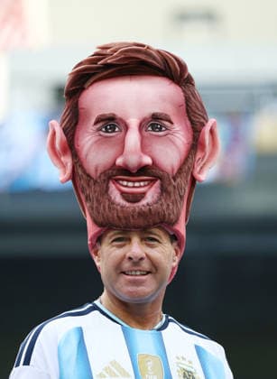 An Argentina fan wears a Lionel Messi hat before the start of a Round of 32 FIFA World Cup, WM, Weltmeisterschaft, Fussball match between Argentina and Cabo Verde at Miami Stadium in Miami, Florida, on Friday, July 3, 2026.  MIA20260703801 CHRISTIANxBRUNSKILL