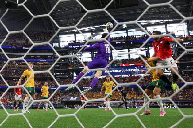 ARLINGTON, TX - JULY 03: Patrick Beach 18 of Australia punches away a ball intended for Mahmoud Hassan Trezeguet 7 of Egypt during the FIFA World Cup, WM, Weltmeisterschaft, Fussball 2026 Round of 32 match between Australia and Egypt on July 3, 2026, at Dallas Stadium in Dallas, Texas. (Photo by David Buono Icon Sportswire) SOCCER: JUL 03 FIFA World Cup 26 Round of 32 - Australia vs Egypt EDITORIAL USE ONLY Icon260703070