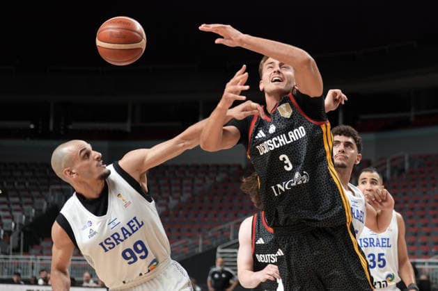Basketball, Israel, Germany, RÄ«ga, Latvia, 03.07.2026, basketball Tim Schneider of Germany and Guy Palatin of Israel in action during FIBA 2027 World Cup European qualifiers Group A game between Israel and Germany national basketball teams In Riga, Latvia, 03.07.2026. Photo: Roman Koksarov (RKF) Riga Latvia Copyright: xRomanxKoksarovx basketISR-GER20260703rk959.JPG