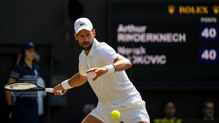(260704) -- LONDON, July 4, 2026 -- Novak Djokovic of Serbia returns the ball during the men s singles third round match against Arthur Rinderknech of France at the Wimbledon Tennis Championships in London, Britain, on July 3, 2026. (Photo by Xinhua) (SP)BRITAIN-LONDON-TENNIS-WIMBLEDON-MEN S SINGLES StephenxChung 
