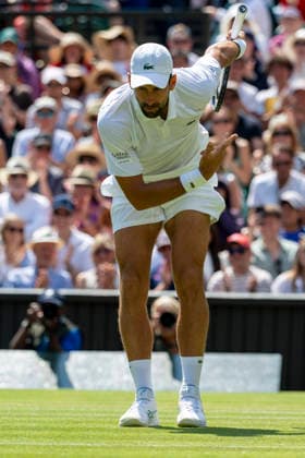 (260704) -- LONDON, July 4, 2026 -- Novak Djokovic of Serbia reacts during the men s singles third round match against Arthur Rinderknech of France at the Wimbledon Tennis Championships in London, Britain, on July 3, 2026. (Photo by Xinhua) (SP)BRITAIN-LONDON-TENNIS-WIMBLEDON-MEN S SINGLES StephenxChung 