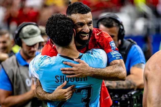 DALLAS - Mohamed Salah of Egypt and goalkeeper Mostafa Shoubir of Egypt celebrate the victory during the 2026 World Cup match between Australia and Egypt at Dallas Stadium on July 3, 2026, in Dallas, United States. (Photo by Stefan Koops EYE4IMAGES DeFodi Images) - *** DALLAS Mohamed Salah of Egypt and goalkeeper Mostafa Shoubir of Egypt celebrate the victory during the 2026 World Cup match between Australia and Egypt at Dallas Stadium on July 3, 2026, in Dallas, United States. Photo by Stefan Koops, EYE4IMAGES, DeFodi Images