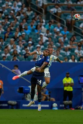 July 3, 2026, Miami Gardens, Florida, USA: Midfielder Deroy D. Duarte (14) of Cape Verde, and Midfielder Alexis Mac Allister (20) of Argentina battle for the ball during the World Cup Round of 32 match between Argentina and Cape Verde at Miami Stadium. Argentina defeated Cape Verde 3-2. World Cup 2026: Round Of 32: Argentina : Cape Verde  - ZUMAd212 20260703_zsp_d212_070 Copyright: xRichardxDolex