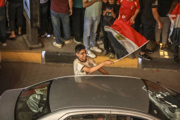 Egyptians celebrate historic advance to World Cup Round of 16 in Cairo CAIRO, EGYPT - JULY 4: Egyptian fans take to the streets to celebrate their national team, Nationalteam s historic victory over Australia to advance to the Round of 16 in the 2026 FIFA World Cup, WM, Weltmeisterschaft, Fussball in Cairo, Egypt, on July 4, 2026. Nationwide celebrations erupted across the country after the Egyptian National Football Team defeated Australia 4-2 on penalties in the Round of 32, reaching this stage for the first time in their history. Supporters gathered in various cities, particularly in the capital Cairo, chanting slogans and carrying flags to mark the historic achievement. Mohamed Elshahed Anadolu Cairo Egypt. Editorial use only. Please get in touch for any other usage.  Copyright: x2026xAnadoluxMohamedxElshahedx