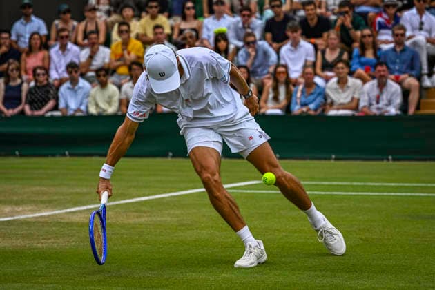 RECORD DATE NOT STATED 4th July 2026; All England Lawn Tennis and Croquet Club, London, England; Wimbledon Tennis Tournament, Day Six; Alex De Minaur (AUS) plays a volley in his third round match against Zachary Svajda (USA) GodfreyxPitt