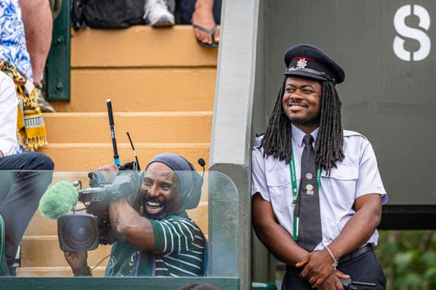 RECORD DATE NOT STATED 4th July 2026; All England Lawn Tennis and Croquet Club, London, England; Wimbledon Tennis Tournament, Day Six; A steward and cameraman enjoy the action on court GodfreyxPitt