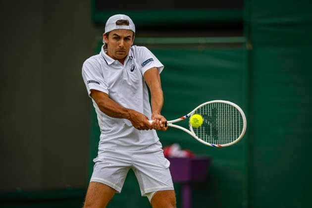 RECORD DATE NOT STATED 4th July 2026; All England Lawn Tennis and Croquet Club, London, England; Wimbledon Tennis Tournament, Day Six; Zachary Svajda (USA) plays a backhand in his third round match against Alex De Minaur (AUS) GodfreyxPitt