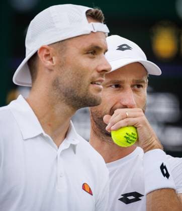 Dutch Sem Verbeek and Belgian Sander Gille pictured during a doubles tennis match between Argentinian-Spain pair Zeballos - Granollers and Belgian-Dutch pair Gille-Verbeek, in the second round of the Men s doubles at the Wimbledon grand slam tennis tournament in London, Britain, Saturday 04 July 2026. BENOITxDOPPAGNE  x180331504x