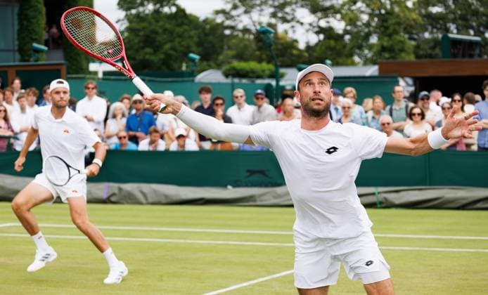 Dutch Sem Verbeek and Belgian Sander Gille pictured during a doubles tennis match between Argentinian-Spain pair Zeballos - Granollers and Belgian-Dutch pair Gille-Verbeek, in the second round of the Men s doubles at the Wimbledon grand slam tennis tournament in London, Britain, Saturday 04 July 2026. BENOITxDOPPAGNE  x180331517x