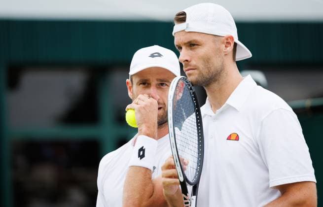Belgian Sander Gille and Dutch Sem Verbeek pictured during a doubles tennis match between Argentinian-Spain pair Zeballos - Granollers and Belgian-Dutch pair Gille-Verbeek, in the second round of the Men s doubles at the Wimbledon grand slam tennis tournament in London, Britain, Saturday 04 July 2026. BENOITxDOPPAGNE  x180331529x