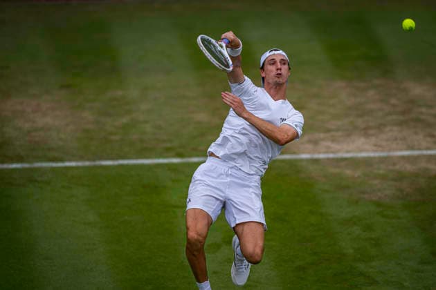 RECORD DATE NOT STATED 4th July 2026; All England Lawn Tennis and Croquet Club, London, England; Wimbledon Tennis Tournament, Day Six; Joe Salisbury (GBR) plays a forehand smash in his first round match with Leylah Fernandez (CAN) against Julian Cash (GBR) and Demi Schuurs (NED) GodfreyxPitt