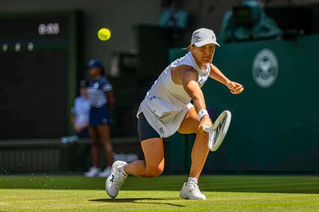 RECORD DATE NOT STATED 4th July 2026; All England Lawn Tennis and Croquet Club, London, England; Wimbledon Tennis Tournament, Day Six; Iga Swiatek (POL) plays a backhand in her third round match against Alexandra Eala (PHI) GodfreyxPitt