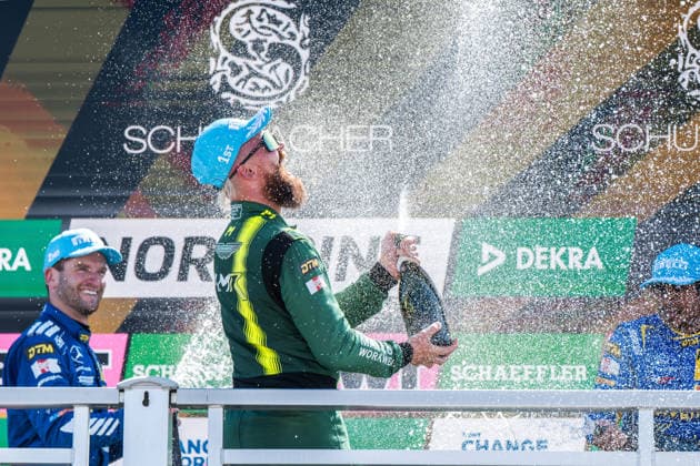04.07.2026, GER, Motorsport, ADAC DTM, Saison 2026, Norisring Rennsieger Nicki Thiim ( Dänemark, Comtoyou Racing, Aston Martin Vantage GT3, 007 ) sprüht mit Sekt auf dem Podium *** July 4, 2026, GER, Motorsports, ADAC DTM, 2026 Season, Norisring Race Winner Nicki Thiim (Denmark), Comtoyou Racing, Aston Martin Vantage GT3, 007 sprays champagne on the podium nordphotoxGmbHx xKnab NP_0100