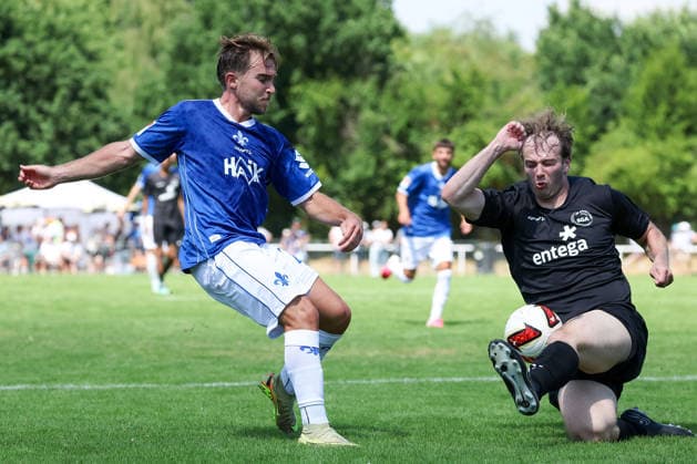 2026.07.04 xjfax Testspiel anlässlich des 150-jährigen Vereinsjubiläums der SG Arheilgen, SG Arheilgen - SV Darmstadt 98 v.l., Lars Kehl (SV Darmstadt 98), Tim Schroeder (SG Arheilgen), zweikampf, action, aktion, battles for the Ball (DFL DFB REGULATIONS PROHIBIT ANY USE OF PHOTOGRAPHS as IMAGE SEQUENCES and or QUASI-VIDEO) *** July 4, 2026 xjfax Friendly match to celebrate the 150th anniversary of SG Arheilgen, SG Arheilgen vs. SV Darmstadt 98 (from left), Lars Kehl (SV Darmstadt 98), Tim Schroeder, SG Arheilgen; tackle, action, battles for the ball. DFL and DFB regulations prohibit any use of photographs as image sequences and or quasi-video. Copyright: HMBxMedia JoaquimxFerreira