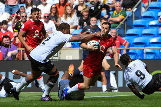 RECORD DATE NOT STATED 4th July 2026; Cardiff City Stadium, Cardiff, Wales; 2026 Nations Championship Rugby, Fiji versus Wales; Tomos Williams of Wales tackeld by Tevita Ikanivere of Fiji AledxHopkins